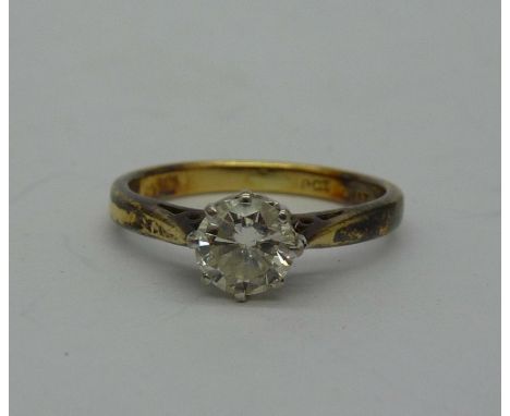 An 8ct gold, platinum set diamond solitaire ring, approximate diamond weight 0.4 carat, weight 2.0g, size H