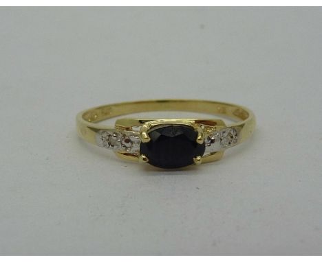 A 9ct gold, sapphire and diamond ring, weight 0.7g, size O