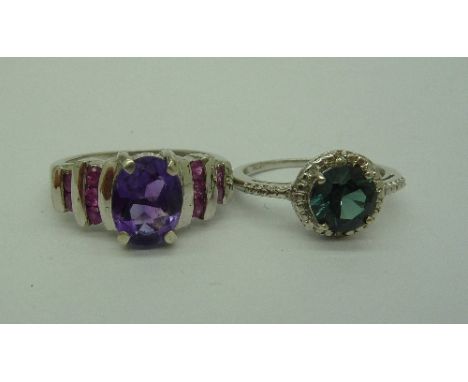 An amethyst and pink sapphire ring and a green quartz and diamond ring, both set in silver, sizes O and M