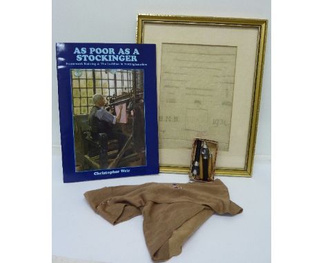 A framed sampler dated 1934, a pair of silk stockings produced by I & R Morley, Heanor to commemorative George VI Coronation,