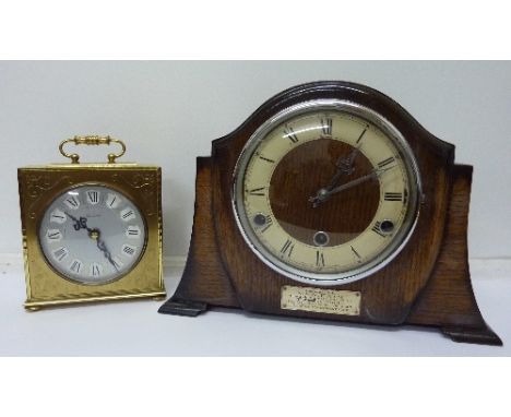 An oak cased Westminster chime mantel clock and a Timemaster mantel clock