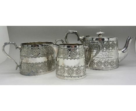 A three piece plated tea service with inscription dated 1914