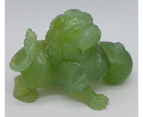 A carved jade dog of foe, height 6.5cm