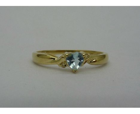 A 9ct gold, blue topaz and diamond ring, weight 1.1g, size O