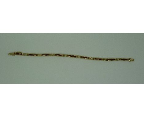 A 9ct gold, ruby and diamond bracelet, weight 10.7g