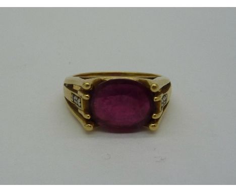 An 18ct gold, ruby and diamond ring, weight 6.5g, size N