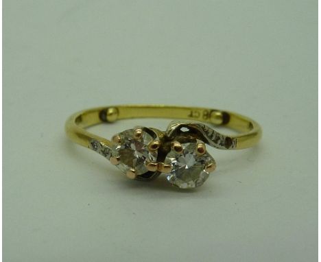 An 18ct gold and two white stone ring, weight 2.5g, size M