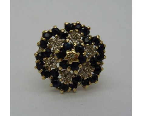 A 9ct gold, sapphire and diamond cluster ring, weight 5.6g, size Q