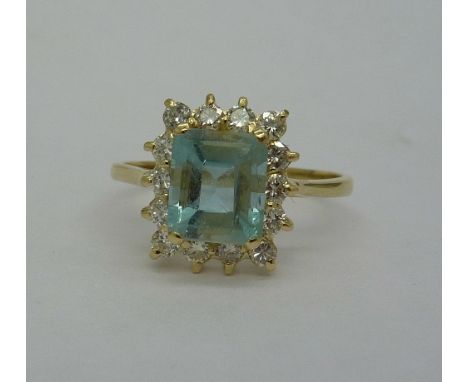 A 14ct gold, aquamarine and diamond cluster ring, weight 3g, size U