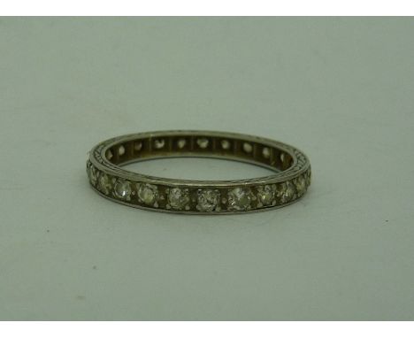 A white metal set, diamond full eternity ring, weight 2.7g, size N