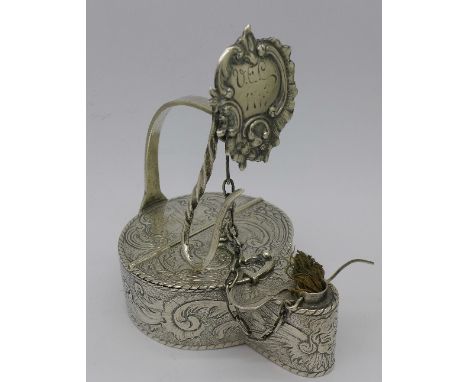 A continental white metal hanging lamp, inscribed V.E.C. 1743 and DN 1940, height 11.5cm