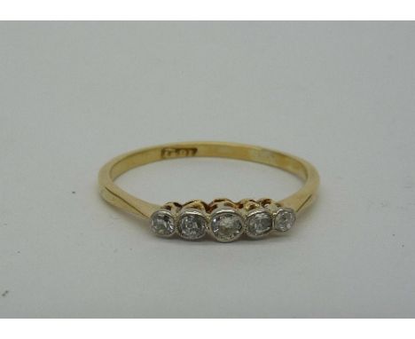 An 18ct gold, five stone diamond ring, weight 1.7g, size Q