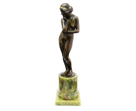 Angelo Negretti (Italian, 1881-1930), an Art Nouveau bronze study of a standing female nude, signed, all-over dark brown pati