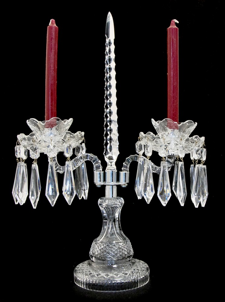 A Waterford crystal, two branch candelabra with lustres and a Prism cut