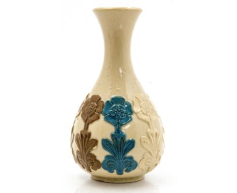 A Doulton stoneware factory sample vase, applied flowers each in a different glaze colour, incised codes above each, 15cm hig