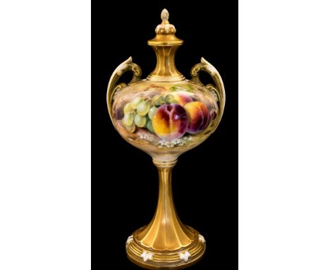 A Royal Worcester fruit painted pedestal vase, twin handled ovoid form, painted by Ricketts, foliate handles and fluted neck 