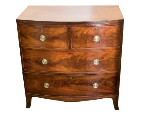 A George III mahogany bowfront chest of drawers, two short over two long drawers, brass ring handles, outswept bracket feet, 