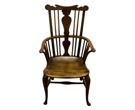 A 19th Century fruitwood Windsor armchair, vase and spindle back, inveted arm supports, dished seat, H stretcher