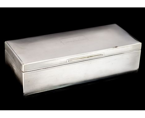 A George VI rectangular large cigarette box, the body with engine-turned decoration, the hinged plain cover with central rect
