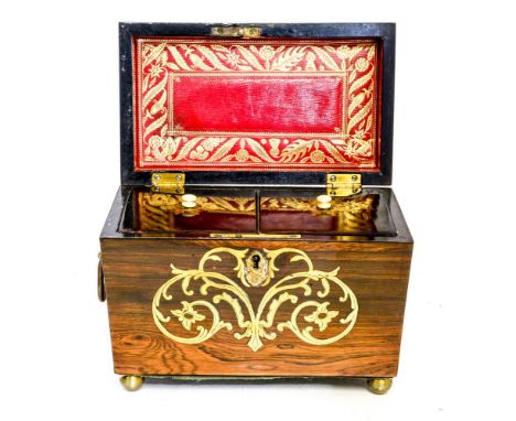 A Regency rosewood and brass inlaid tea caddy, circa 1825, or sarcophagus form, double division lidded interior, brass ball f