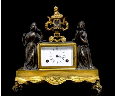 Moser, Paris, a 19th Century ormolu and bronze desk inkstandish incorporating a clock, surmounted with an urn ink pot, clock 