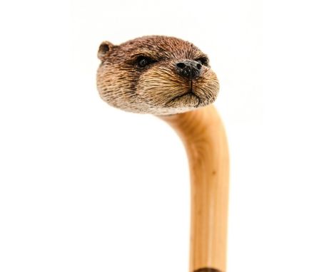 Ian Taylor, a fine hand crafted Otter head walking stick, the shaft resembling a Hazel Snake, complete with certificate of au