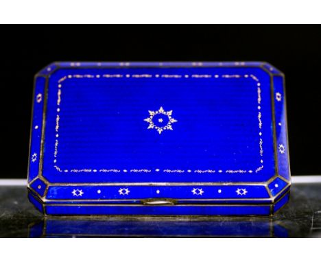 An Austro Hungarian silver gilt and enamelled box, Royal blue guilloche enamel with gold inlay within, faceted rectangular se