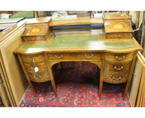A late 19th Century mahogany Carlton House writing desk, circa 1890, strung and marquetry inlaid throughout, brass gallery, t