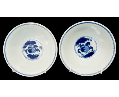 A pair of Eight Horses of Mu Wang bowls, marks of Jiajing, mid 17th century, of flared conical form, the eighth horse within,