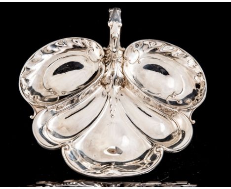 An Edwardian Art Nouveau stylised leaf shaped silver canape dish, the handle with acanthus with thumb piece, James Dixon & So