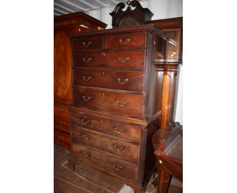 A George III mahogany chest on chest, the upper section with plain dentil moulding to cornice and fitted with two short over 