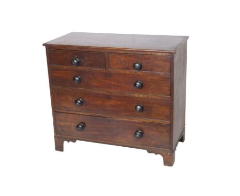 A George III mahogany chest of two short over three long graduated and cockbeaded drawers, on ogee bracket feet, 102cm wide, 