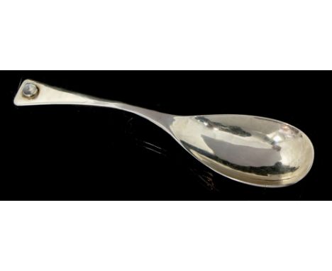 An Art & Crafts silver dessert spoon, elongated bowl the handle set with rock crystal cabochon, Charles Horner, date letter f