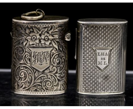 A Victorian silver vesta case, oblong shaped with engine turned decoration with shaped cartouche engraved with initials LHA d