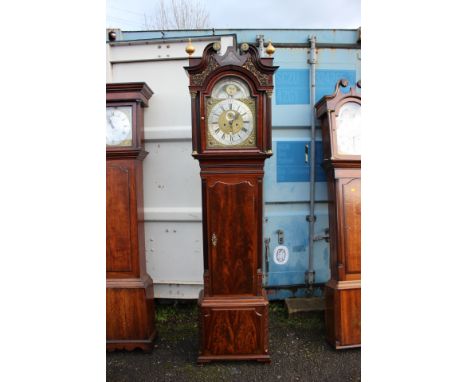 A George III mahogany eight day longcase clock, by J. Ogden, Halifax, the hood with a swan neck pediment and spherical finial