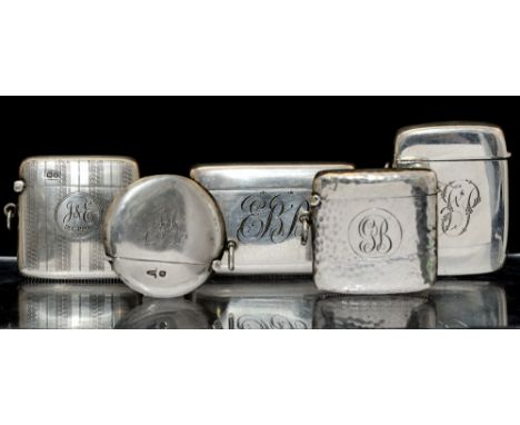 A George V plain silver vesta case, rectangular engraved with initials, Charles S Green, Birmingham, 1913; another plain silv