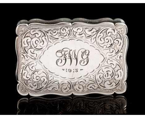 A Victorian silver snuff box, shaped rectangular the hinged cover and base engraved with scrolling foliage, the cover engrave