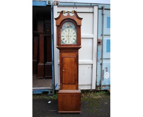 A George III oak and mahogany eight day longcase clock, the dial inscribed John Blaylock, the hood with a swan neck pediment,