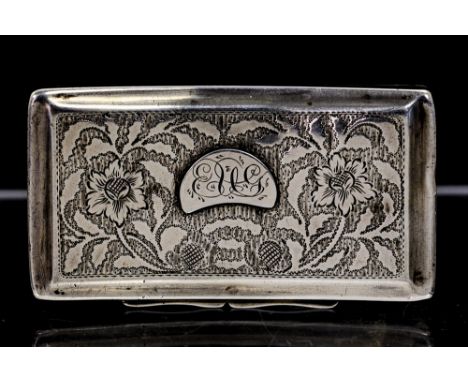 A George IV silver snuff box, curved oblong shape engine turned floral and striated decoration, the cover with crescent shape