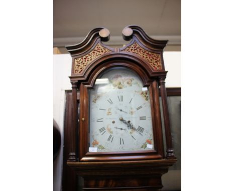 A George III oak and mahogany cross-banded longcase clock, white dial with painted decoration and painted spandrels, fretwork