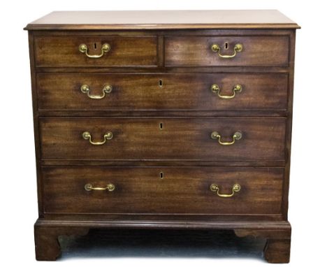 A George III mahogany chest of drawers, circa 1770, moulded top, two short over three long drawers with brass drop handles, s