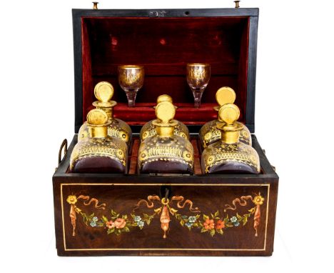 A late 19th Century European case decanter set, circa 1870, bow front case with painted vase and swags, opening to a velvet l