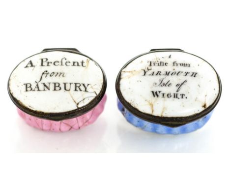 Two late 18th Century Bilston enamel oval patch boxes, circa 1770, one pink, the other blue enamel, each with a motto to the 