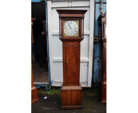 A George III oak 30 hour longcase clock, by Blaylock, Longtown, the dial with a silvered centre, gilt spandrels, the hood wit