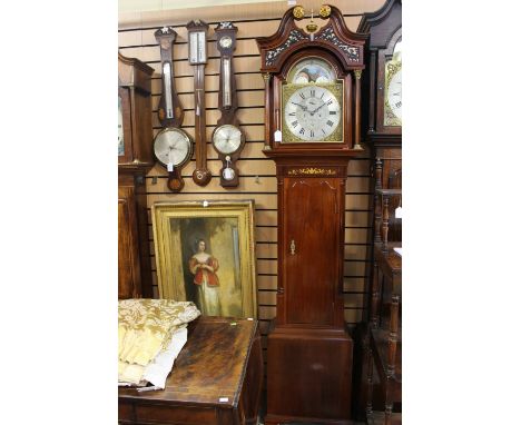 A George III mahogany eight day longcase clock, the dial inscribed 'John Blaylock, Derby' the hood with a swan neck pediment 