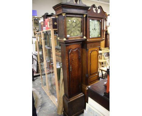 A George III oak longcase clock, broken pediment, columns to hood, brass 11 inch dial inscribed 'Donisthorpe', 30 hour single