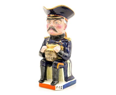 A WWI Wilkinson pottery toby jug, 'Bitter for the Kaiser' signed Carruthers Gould and retailed by Soane & Smith, London, 'Adm