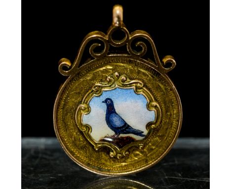 A George V 9ct gold Pigeon medal with central enamel circular plaque depicting a pigeon, the reverse with vacant cartouche, G