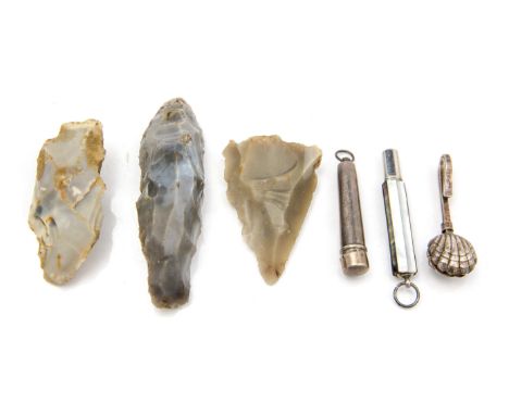 Three Derbyshire Neolithic tools, hand axe and spear head etc., together with silver napkin hook, pencil etcProvenance:Found 