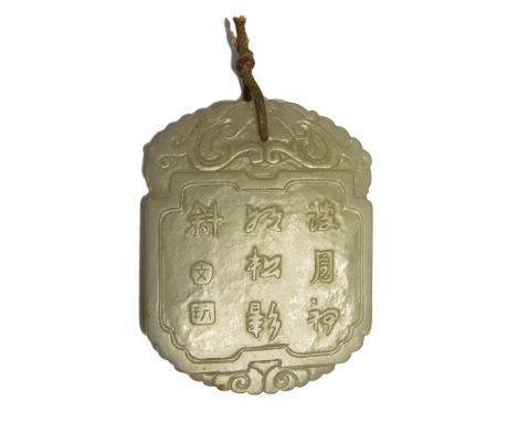 A Chinese pale jade abstinence plaque/pendant, carved in low relief with a 'grass script' text, the other side with a scholar
